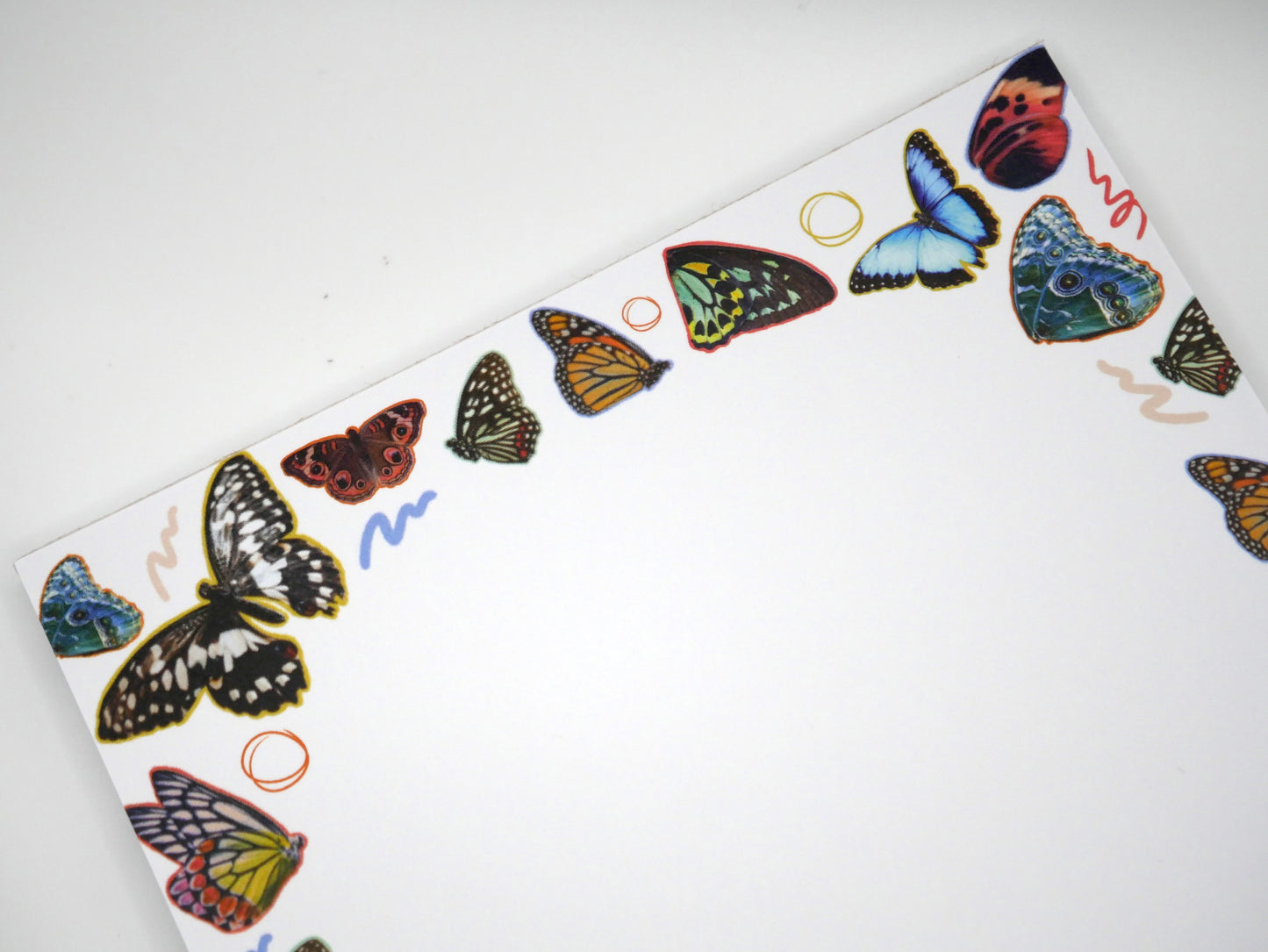 Capture everyday magic with our butterfly wings 5x7 notepad—50 thick, no-bleed sheets to brighten your to-dos and notes. Made in the USA.