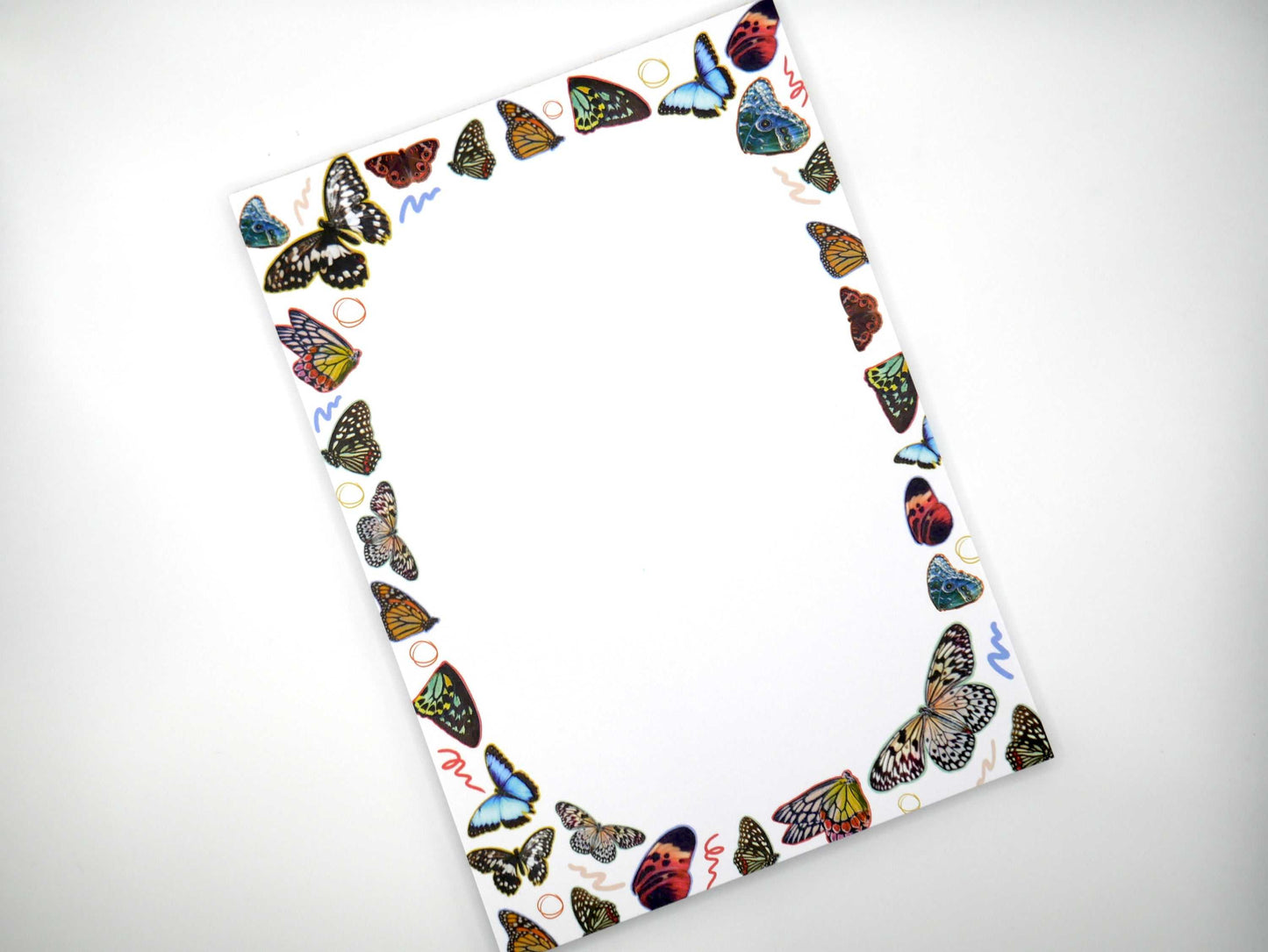 Capture everyday magic with our butterfly wings 5x7 notepad—50 thick, no-bleed sheets to brighten your to-dos and notes. Made in the USA.