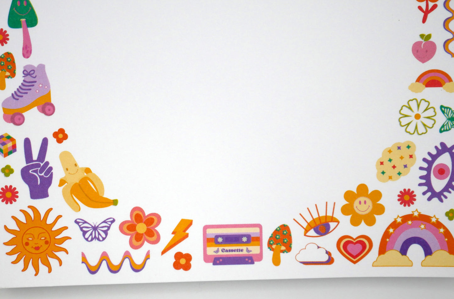 We took the best symbols of the 70s and 90s, such as flowers and peace signs, and turned them into this fun retro 5x7" notepad. Printed in the USA.