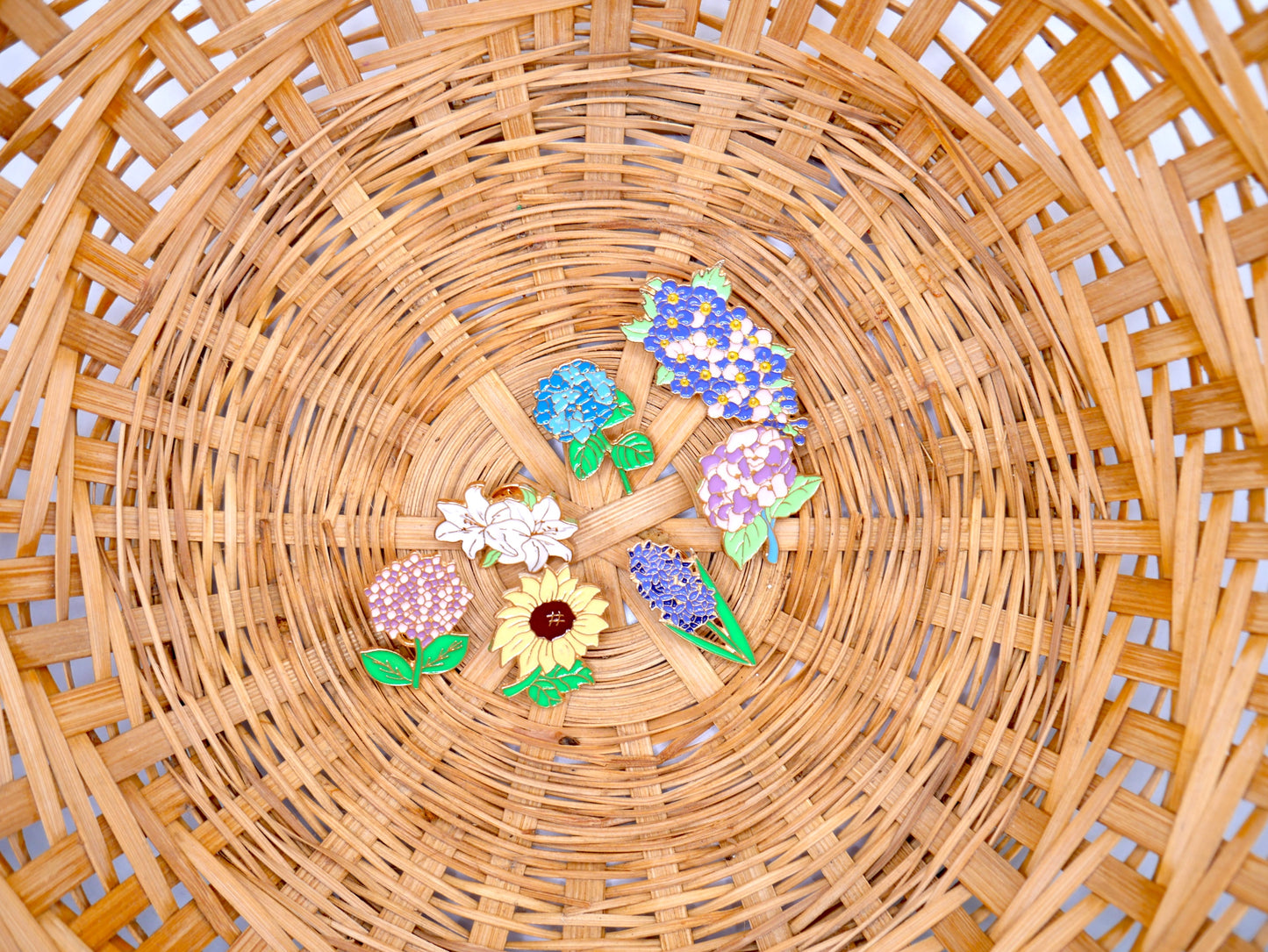 Get in the spring and summer feeling with a randomly chosen set of 3 flower enamel metal pins.