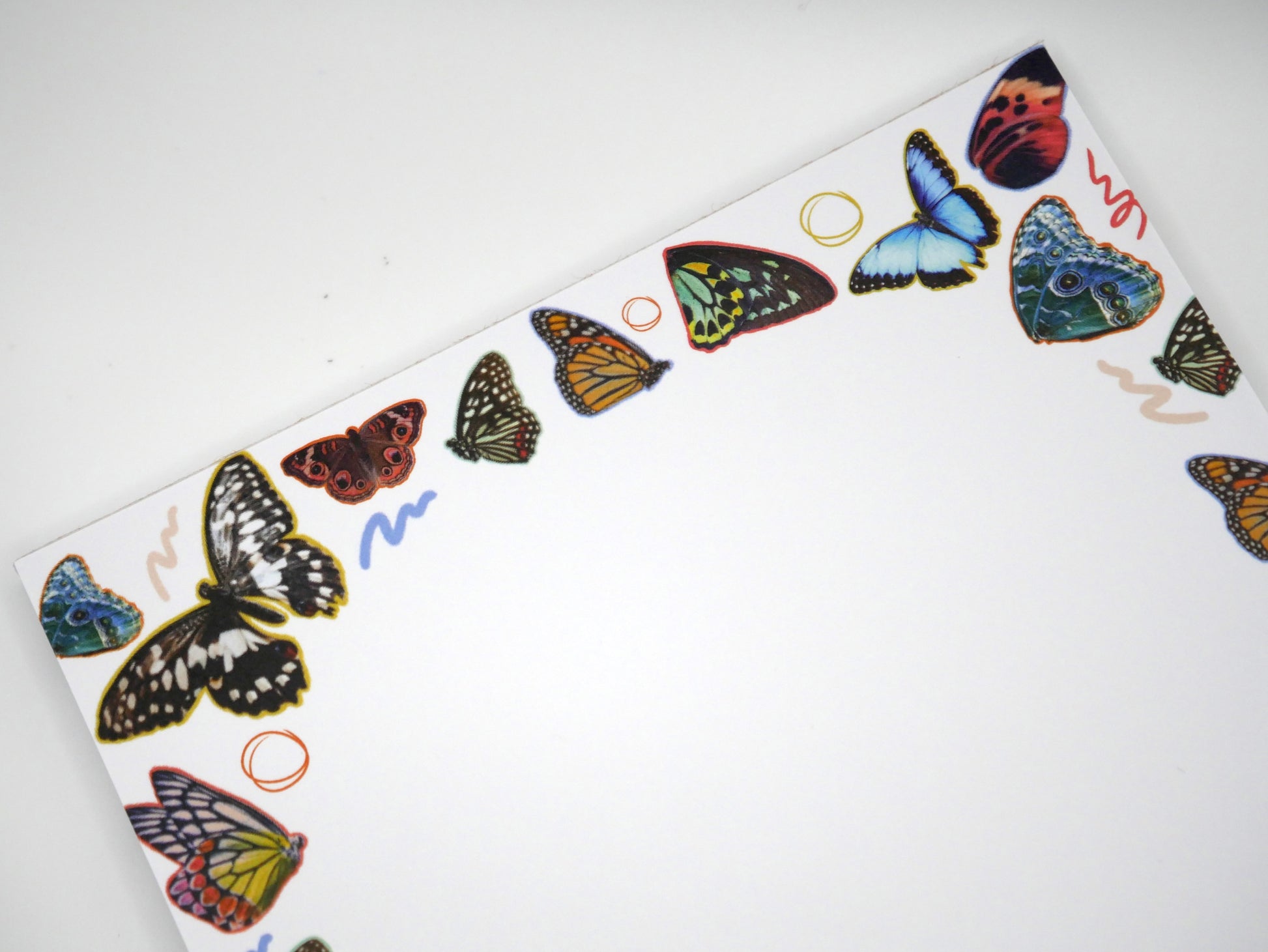 Capture everyday magic with our butterfly wings 5x7 notepad—50 thick, no-bleed sheets to brighten your to-dos and notes. Made in the USA.
