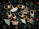 Celestial Moth Metal Keychain and Bag Charm, Acrylic Gummy Bear & Star Keychain and Bag Charm bag charm, purse charm, key ring, key fob, zipper pull, backpack charm, cute keychain, Butterfly & Moth: monarch butterfly, luna moth, swallowtail, painted lady, moth lover, insect wings, butterfly print, metamorphosis, garden butterflies, pollinators, entomology art