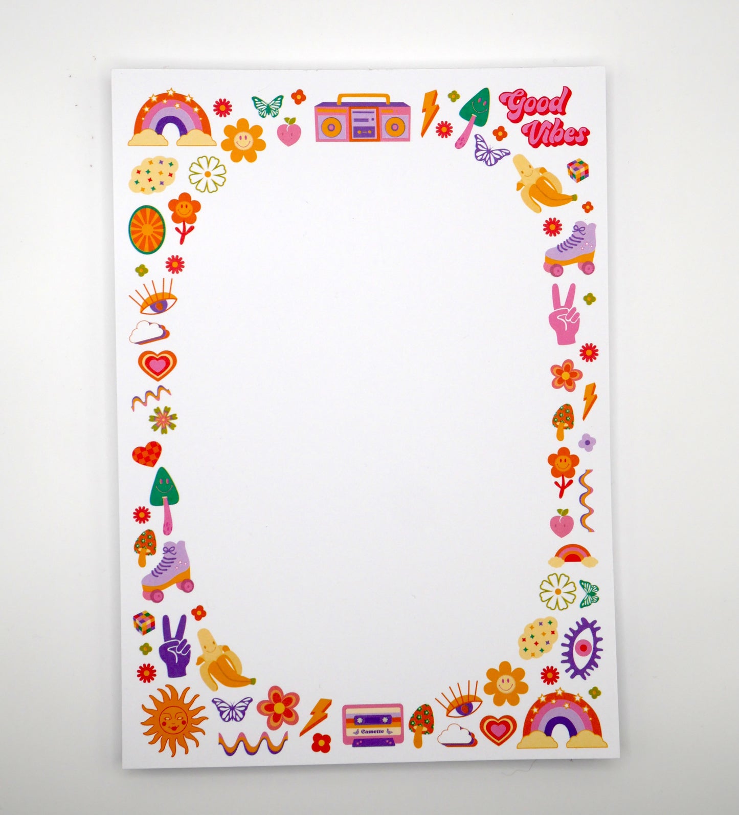 We took the best symbols of the 70s and 90s, such as flowers and peace signs, and turned them into this fun retro 5x7" notepad. Printed in the USA. 